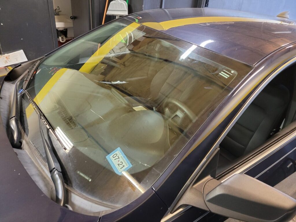 windshield repair at Omni Auto Glass shop