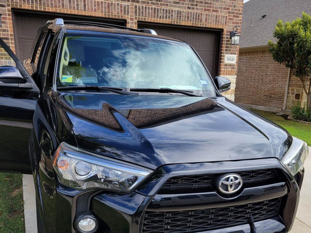 Black SUV with newly replaced windshield