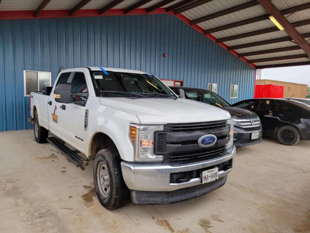 White truck with new windshield