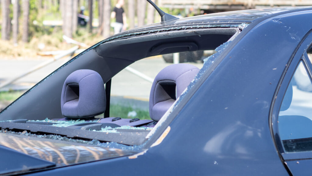 A car after an accident with a broken rear window